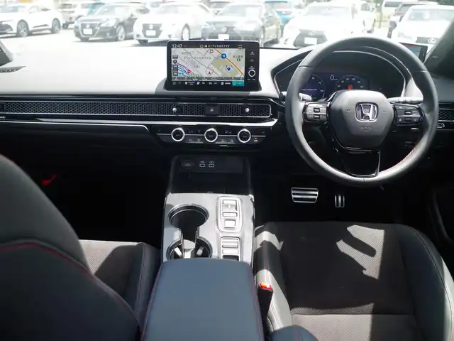 ホンダ シビック e:HEV 千葉県 2022(令4)年 2.2万km クリスタルブラックパール ホンダセンシング/・衝突軽減ブレーキ（CMBS）/・車線維持支援システム（LKAS）/・アダプティブクルーズコントロール（ACC）/・後方誤発進抑制機能/・誤発進抑制機能/運転席パワーシート/ハーフレザーシート/ワイヤレス充電/9インチ純正コネクトナビ/地デジTV/【Bluetooth接続】/バックカメラ/ドライブレコーダー（DRH-224SD）/社外レーダー（AR-33）/革巻きステアリング/ステアリングスイッチ/パドルシフト/ETC/LEDヘッドライト/フォグライト/ウインカーミラー/コーナーセンサー/純正18インチアルミホイル/サイド/カーテンエアバッグ/Honda スマートキー