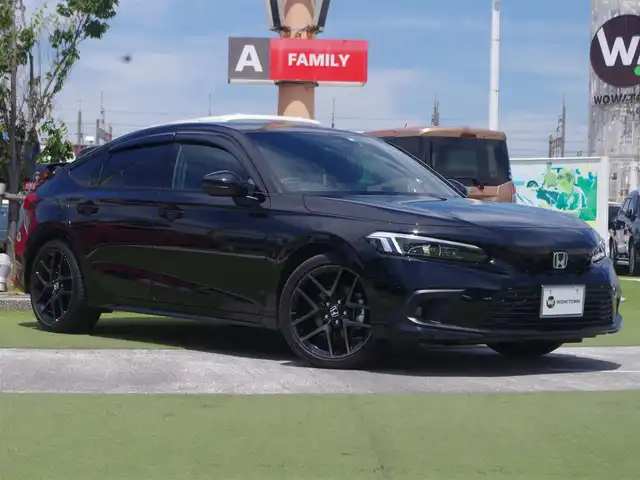 ホンダ シビック e:HEV 千葉県 2022(令4)年 2.2万km クリスタルブラックパール ホンダセンシング/・衝突軽減ブレーキ（CMBS）/・車線維持支援システム（LKAS）/・アダプティブクルーズコントロール（ACC）/・後方誤発進抑制機能/・誤発進抑制機能/運転席パワーシート/ハーフレザーシート/ワイヤレス充電/9インチ純正コネクトナビ/地デジTV/【Bluetooth接続】/バックカメラ/ドライブレコーダー（DRH-224SD）/社外レーダー（AR-33）/革巻きステアリング/ステアリングスイッチ/パドルシフト/ETC/LEDヘッドライト/フォグライト/ウインカーミラー/コーナーセンサー/純正18インチアルミホイル/サイド/カーテンエアバッグ/Honda スマートキー