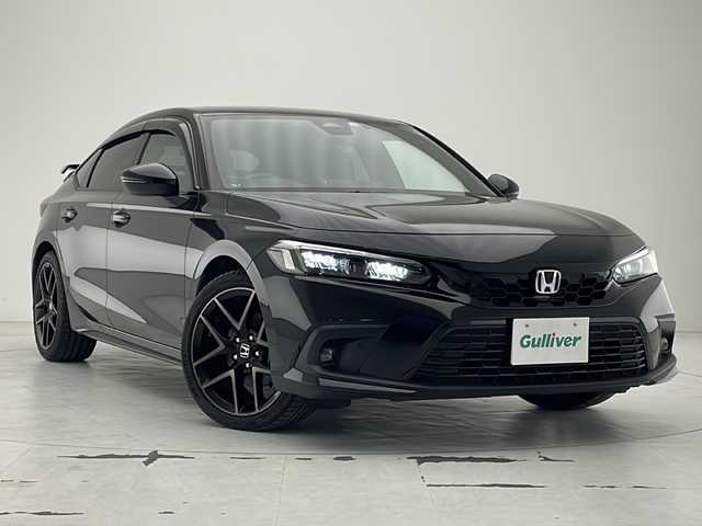 ホンダ シビック e:HEV 沖縄県 2022(令4)年 2.2万km クリスタルブラックパール 純正９型コネクトナビ　/　(フルセグTV Bluetooth FM/AM)　/ＢＯＳＥサウンド　/バックカメラ　/ＬＥＤヘッドライト　/前後ドライブレコーダー　/アダプティブクルーズコントロール　/ハーフレザーシート　/パワーシート/ホンダセンシング/ETC2.0
