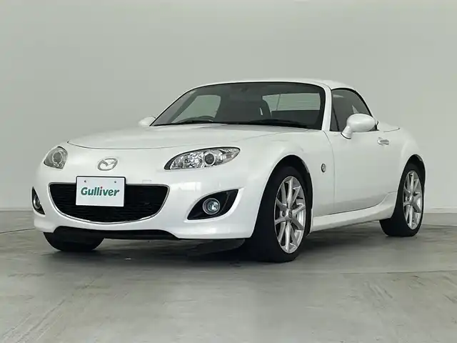 マツダ ロードスター RS RHT 群馬県 2010(平22)年 6.9万km クリスタルホワイトパールマイカ レザーパッケージ/・サイドドアトリムアームレストソフトパッド（合成皮革）/・シート材質　本革（ブラック）/・センターコンソールリッドソフトパッド（合成皮革）/・シートヒーター（温度５段調整機能付）/・シフトノブ本革巻（アルミリング付）/＝＝＝＝/6MT/電動開閉ハードトップ/スマートキー /HIDヘッドライト/フロントフォグランプ /純正17インチAW/社外クラリオンオーディオ