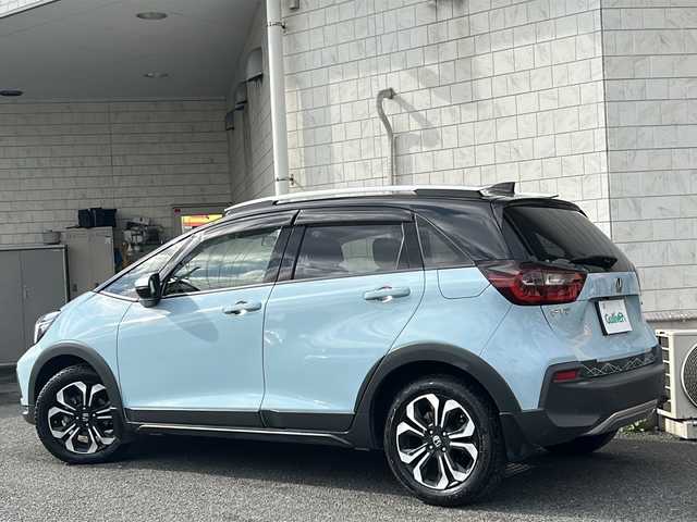 ホンダ フィット e:HEVクロスター 神奈川県 2020(令2)年 5.6万km サーフブルー/ブラック ワンオーナー/純正ナビ/（CD/DVD/AM/FM/SD/USB/AUX/BT/フルセグTV)/バックカメラ/前後ドライブレコーダー/オプション静止画撮影機能/ETC2.0/レーダークルーズコントロール/電動パーキングブレーキ/コーナーセンサー/横滑り防止装置/路外逸脱抑制機能/踏み間違い衝突軽減システム/ABS/ドアバイザー/ISOFIX/純正フロアマット/純正アルミホイール/スペアキー×１/保証書/取扱説明書