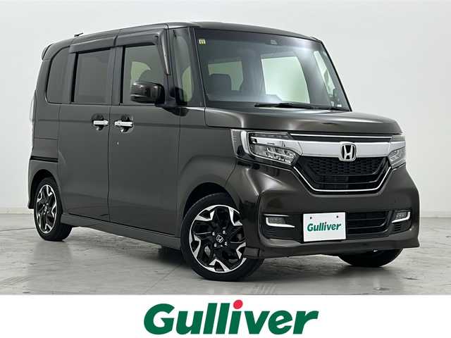 ホンダ Ｎ ＢＯＸ カスタム G L ターボ ホンダセンシング 宮城県 2020(令2)年 5.4万km プレミアムグラマラスブロンズP 禁煙車/ホンダセンシング/・衝突軽減ブレーキ/・路外逸脱抑制機能/・アダプティブクルーズコントロール/・車線維持支援システム/・標識認識機能/・先行車発進お知らせ機能/バックカメラ/両側パワースライドドア/前席シートヒーター/純正7型SDナビ/・BT/CD/USB/iPod/SD/純正ビルトインETC/パドルシフト/ステアリングスイッチ/プッシュスタート/スマートキー/スペアキー/純正LEDヘッドライト/純正LEDフォグランプ/純正15インチアルミホイール/横滑り防止装置/アイドリングストップ