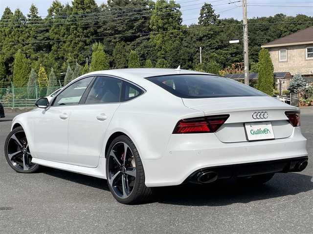 アウディ ＲＳ７ スポーツバック 千葉県 2015(平27)年 2.7万km グレイシアホワイトメタリック 色コード:LS9R（グレイシアホワイトメタリック）/純正HDDナビ/フルセグTV/BOSEサウンドシステム/サンルーフ/黒レザーシート/前後カメラ/純正21インチAW/レッドキャリパー/RSスポーツエグゾースト/４ゾーンエアコン/レーダークルーズコントロール/衝突軽減ブレーキ/レーンキープアシスト/ブラインドスポットモニター/マトリックスLEDヘッドライト/カーボンミラーカバー/取扱説明書/スペアキー