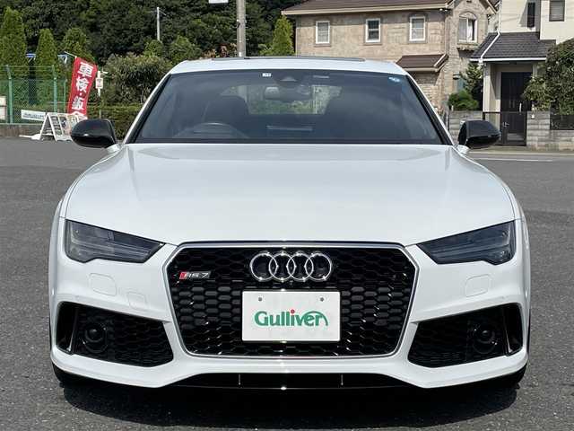 アウディ ＲＳ７ スポーツバック 千葉県 2015(平27)年 2.7万km グレイシアホワイトメタリック 色コード:LS9R（グレイシアホワイトメタリック）/純正HDDナビ/フルセグTV/BOSEサウンドシステム/サンルーフ/黒レザーシート/前後カメラ/純正21インチAW/レッドキャリパー/RSスポーツエグゾースト/４ゾーンエアコン/レーダークルーズコントロール/衝突軽減ブレーキ/レーンキープアシスト/ブラインドスポットモニター/マトリックスLEDヘッドライト/カーボンミラーカバー/取扱説明書/スペアキー