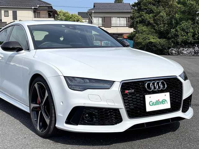 アウディ ＲＳ７ スポーツバック 千葉県 2015(平27)年 2.7万km グレイシアホワイトメタリック 色コード:LS9R（グレイシアホワイトメタリック）/純正HDDナビ/フルセグTV/BOSEサウンドシステム/サンルーフ/黒レザーシート/前後カメラ/純正21インチAW/レッドキャリパー/RSスポーツエグゾースト/４ゾーンエアコン/レーダークルーズコントロール/衝突軽減ブレーキ/レーンキープアシスト/ブラインドスポットモニター/マトリックスLEDヘッドライト/カーボンミラーカバー/取扱説明書/スペアキー