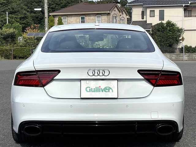 アウディ ＲＳ７ スポーツバック 千葉県 2015(平27)年 2.7万km グレイシアホワイトメタリック 色コード:LS9R（グレイシアホワイトメタリック）/純正HDDナビ/フルセグTV/BOSEサウンドシステム/サンルーフ/黒レザーシート/前後カメラ/純正21インチAW/レッドキャリパー/RSスポーツエグゾースト/４ゾーンエアコン/レーダークルーズコントロール/衝突軽減ブレーキ/レーンキープアシスト/ブラインドスポットモニター/マトリックスLEDヘッドライト/カーボンミラーカバー/取扱説明書/スペアキー