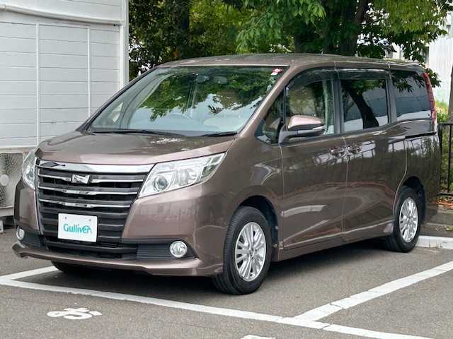 トヨタ ノア G 宮城県 2014(平26)年 5.8万km ダークシェリーマイカM ワンオーナー/純正ナビ/バックカメラ/クルーズコントロール/オートマチックハイビーム/MTモード付きAT/LEDヘッドライト/フォグランプ/オートライト/純正ビルトインETC/純正フロアマット/純正アルミホイール/Bluetooth、CD、DVD/フルセグTV/アイドリングストップ/横滑り防止装置