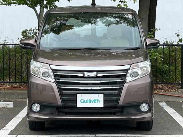 トヨタ ノア G 宮城県 2014(平26)年 5.8万km ダークシェリーマイカM ワンオーナー/純正ナビ/バックカメラ/クルーズコントロール/オートマチックハイビーム/MTモード付きAT/LEDヘッドライト/フォグランプ/オートライト/純正ビルトインETC/純正フロアマット/純正アルミホイール/Bluetooth、CD、DVD/フルセグTV/アイドリングストップ/横滑り防止装置