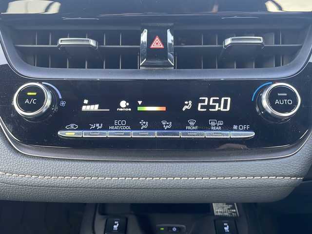 トヨタ カローラツーリング ハイブリッド ダブルバイビー 青森県 2020(令2)年 2.2万km スパークリングブラックパールクリスタルシャイン 4WD/OP純正9インチDAナビ・フルセグTV/バックカメラ/合皮コンビシート/OP前席シートヒーター/OPおくだけ充電/OP AC100V1500W/ステアリングヒーター/セーフティセンス/プリクラッシュセーフティ/レーダークルーズコントロール/レーントレーシングアシスト/オートマチックハイビーム/インテリジェントクリアランスソナー/前後ドライブレコーダー/ビルトインETC2.0/LEDヘッドライト/LEDフォグランプ/純正17インチアルミ/モデリスタフロントスポイラー/ルーフレール/スマートキー/プッシュスタート
