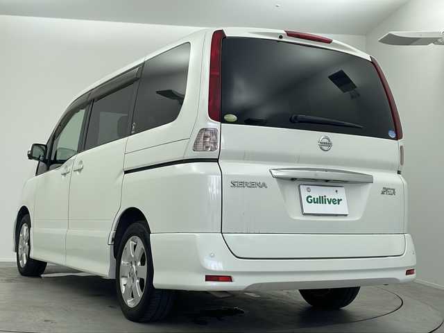 日産 セレナ ハイウェイスター Vセレクション 大阪府 2009(平21)年 9.9万km ホワイトパール 純正7インチHDDナビ/・TV/・CD/DVD/アラウンドビューモニター/純正フリップダウンモニター/純正16インチAW/純正HIDヘッドライト/・オートライト/純正ビルトインETC/両側パワースライドドア/100V充電/スマートキー×２/CLEAN ION エアコン
