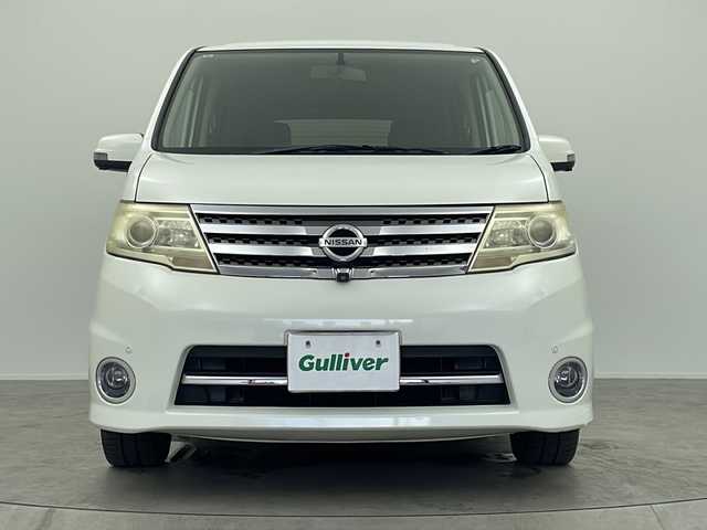日産 セレナ ハイウェイスター Vセレクション 大阪府 2009(平21)年 9.9万km ホワイトパール 純正7インチHDDナビ/・TV/・CD/DVD/アラウンドビューモニター/純正フリップダウンモニター/純正16インチAW/純正HIDヘッドライト/・オートライト/純正ビルトインETC/両側パワースライドドア/100V充電/スマートキー×２/CLEAN ION エアコン