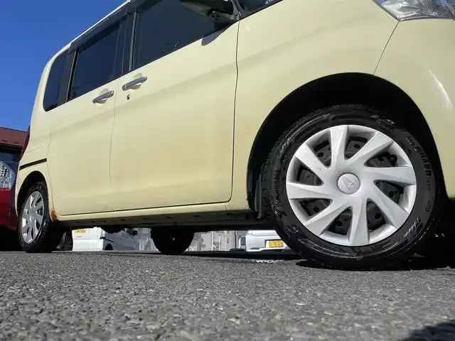 ダイハツ タント L SA 宮城県 2014(平26)年 16.7万km コットンアイボリー 4WD/社外オーディオ/（ＦＭ／ＡＭ／ＣＤ／ＡＵＸ／ＵＳＢ）　/スマートアシスト　/アイドリングストップ　/横滑り防止装置　/ベンチシート　/ライトレベライザー　/リモコンキー　/電動格納ミラー
