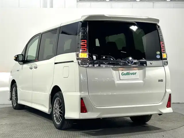 トヨタ ヴォクシー ハイブリッド ZS 煌 大阪府 2018(平30)年 4.7万km ホワイトパールクリスタルシャイン モデリスタエアロ ALPINEナビ(フルセグ/DVD再生/Bluetooth) バックカメラ 後席モニター ETC 衝突軽減 クルコン トヨタセーフティセンス シートヒーター 両側パワースライドドア