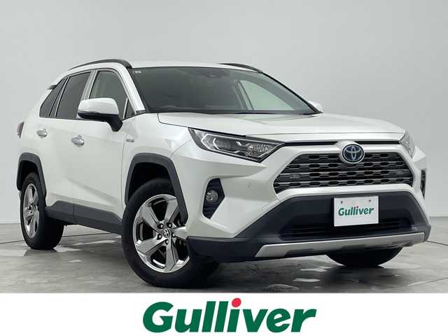 トヨタ ＲＡＶ４ ハイブリッドG 三重県 2019(令1)年 8.7万km ホワイトパールクリスタルシャイン 禁煙車/ＢＳＭ　/社外９インチナビ　/CD/DVD/BT/MSV/フルセグTV/シートヒーター　/バックカメラ　/ＥＴＣ　/クリアランスソナー　/D席パワーシート　/ステアリングヒーター　/レーダークルーズコントロール　/オートハイビーム　/前方ドライブレコーダー/電動パーキングブレーキ/オートホールド/パワーバックドア
