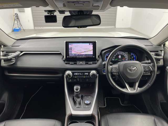 トヨタ ＲＡＶ４ ハイブリッドG 三重県 2019(令1)年 8.7万km ホワイトパールクリスタルシャイン 禁煙車/ＢＳＭ　/社外９インチナビ　/CD/DVD/BT/MSV/フルセグTV/シートヒーター　/バックカメラ　/ＥＴＣ　/クリアランスソナー　/D席パワーシート　/ステアリングヒーター　/レーダークルーズコントロール　/オートハイビーム　/前方ドライブレコーダー/電動パーキングブレーキ/オートホールド/パワーバックドア