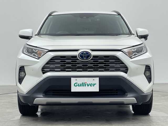 トヨタ ＲＡＶ４ ハイブリッドG 三重県 2019(令1)年 8.7万km ホワイトパールクリスタルシャイン 禁煙車/ＢＳＭ　/社外９インチナビ　/CD/DVD/BT/MSV/フルセグTV/シートヒーター　/バックカメラ　/ＥＴＣ　/クリアランスソナー　/D席パワーシート　/ステアリングヒーター　/レーダークルーズコントロール　/オートハイビーム　/前方ドライブレコーダー/電動パーキングブレーキ/オートホールド/パワーバックドア