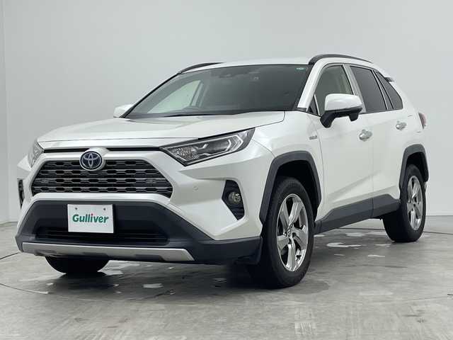 トヨタ ＲＡＶ４ ハイブリッドG 三重県 2019(令1)年 8.7万km ホワイトパールクリスタルシャイン 禁煙車/ＢＳＭ　/社外９インチナビ　/CD/DVD/BT/MSV/フルセグTV/シートヒーター　/バックカメラ　/ＥＴＣ　/クリアランスソナー　/D席パワーシート　/ステアリングヒーター　/レーダークルーズコントロール　/オートハイビーム　/前方ドライブレコーダー/電動パーキングブレーキ/オートホールド/パワーバックドア