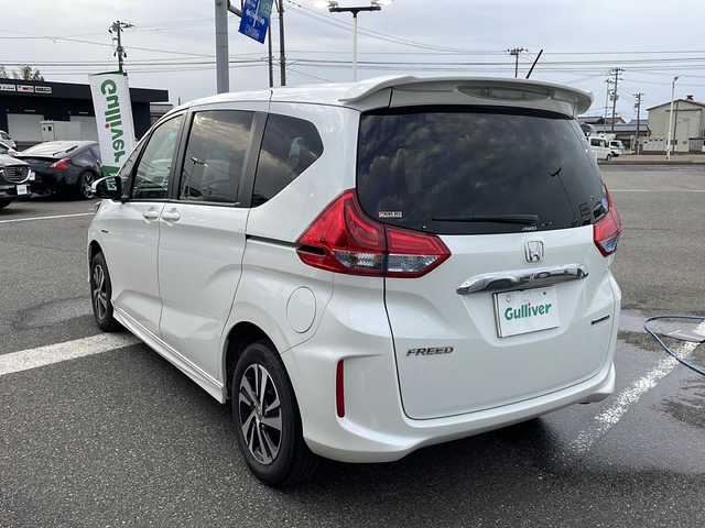 ホンダ フリード ハイブリット G ホンダセンシング 新潟県 2017(平29)年 8.1万km ホワイトオーキッドパール ワンオーナー/純正ナビ　ＴＶ/LEDライト/Bluetooth/両側パワースライドドア/シートヒーター/ステアリングスイッチ/ビルトインETC/前方ドライブレコーダー/カーテンエアバッグ/パーキングアシスト/純正フロアマット/クルーズコントロール/ハーフレザーシート/バックカメラ