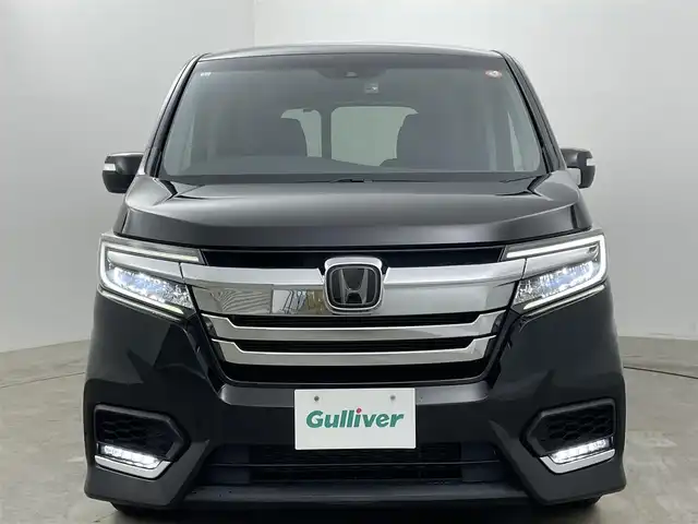 ホンダ ステップワゴン スパーダ eHEV G ホンダS 岡山県 2020(令2)年 5.1万km プレミアムスパークルブラックパール 純正9インチメモリナビ/（CD/DVD/Bluetooth/フルセグ/HDMI）/純正11.6インチフリップダウンモニター/ビルトインETC2.0/両側パワースライドドア/LEDヘッドライト/バックカメラ/レーダークルーズコントロール/前後ドライブレコーダー/レーンキープアシスト/プッシュスタート/スマートキー×2/ドアバイザー/フロアマット
