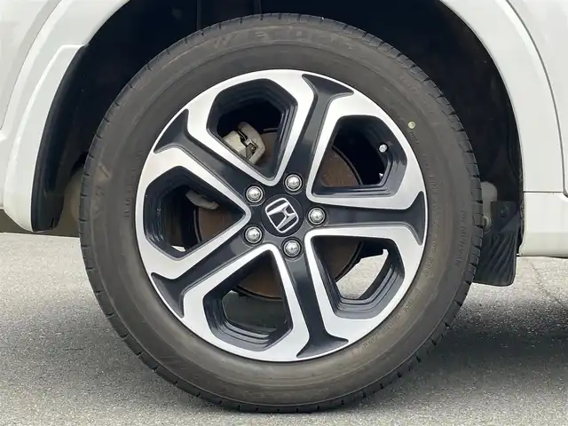 ホンダ ヴェゼル ハイブリッド Z 静岡県 2014(平26)年 4.9万km ホワイトオーキッドパール エンジンスタートボタン/スマートキー/スペアキー1本/パワーステアリング/パワーウィンドウ/MTモード付きAT/寒冷地仕様/オートエアコン/保証書/取扱説明書/記録簿/アイドリングストップ/クルーズコントロール/バックカメラ/純正ETC/純正ナビ（CD.DVD.BT.フルセグ）/純正フロアマット/純正アルミホイール/D席N席シートヒーター/ルーフレール/ABS/横滑り防止装置/オートライト/LEDライト/W+サイドエアバック/カーテンエアバック/衝突軽減システム
