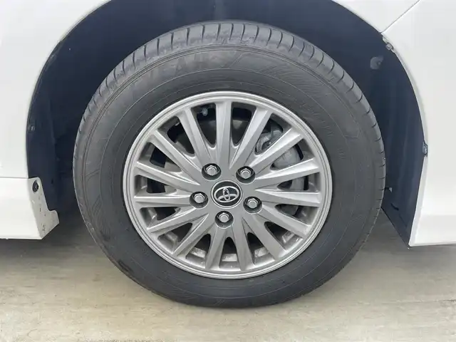 トヨタ エスクァイア ハイブリッド Gi 岡山県 2015(平27)年 7万km ホワイトパールクリスタルシャイン 社外9インチナビ(X900)/(Bluetooth/CD/DVD/フルセグTV)/社外10.1インチ後席モニター(TMX-RM300S)/両側電動スライドドア/合皮シート/シートヒーター(運転席・助手席)/バックカメラ/置くだけ充電/ドアバイザー/クルーズコントロール/純正LEDヘッドライト/オートライト/スマートキー(1本)/純正フロアマット/純正アルミホイール/ビルトインETC/アイドリングストップ