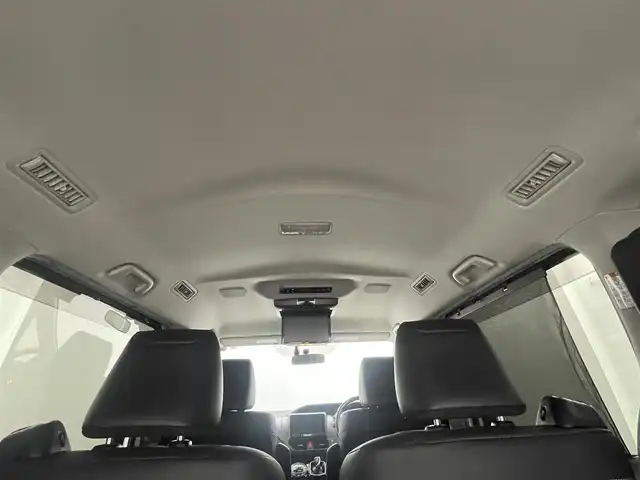 トヨタ エスクァイア ハイブリッド Gi 岡山県 2015(平27)年 7万km ホワイトパールクリスタルシャイン 社外9インチナビ(X900)/(Bluetooth/CD/DVD/フルセグTV)/社外10.1インチ後席モニター(TMX-RM300S)/両側電動スライドドア/合皮シート/シートヒーター(運転席・助手席)/バックカメラ/置くだけ充電/ドアバイザー/クルーズコントロール/純正LEDヘッドライト/オートライト/スマートキー(1本)/純正フロアマット/純正アルミホイール/ビルトインETC/アイドリングストップ