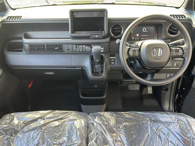 ホンダ Ｎ ＢＯＸ カスタム 広島県 2025(令7)年 0.1万km クリスタルブラックパール Honda SENSING/●衝突軽減ブレーキ（CMBS）/●先行車発進お知らせ機能/●歩行者事故低減ステアリング/●路外逸脱抑制機能/●標識認識機能/●渋滞追従機能付アダプティブクルーズコントロール（ACC）/●車線維持支援システム（LKAS）/●誤発進抑制機能/●後方誤発進抑制機能/●近距離衝突軽減ブレーキ/●急アクセル抑制機能/●パーキングセンサーシステム/●オートハイビーム/ダイレクトプロジェクション式フルLEDヘッドライト/シーケンシャルターンランプ/片側パワースライドドア/ナビ装着用スペシャルパッケージ/シートヒーター（D/N）/フロントシートアームレスト（運転席）/オートリトラミラー/スマートキー/プッシュスタート/ロールサンシェード/フルエアコン/W+サイド+カーテンエアバッグ/電子制御パーキングブレーキ/オートブレーキホールド機能/360°スーパーUV・IRカット パッケージ/エマージェンシーストップシグナル/トリコットシート（ブラック）/14インチアルミホイール（シャークグレー塗装＋切削）