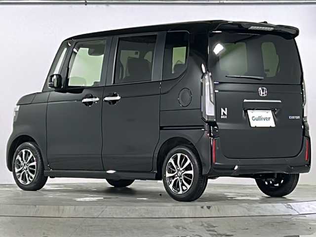 ホンダ Ｎ ＢＯＸ カスタム 広島県 2025(令7)年 0.1万km クリスタルブラックパール Honda SENSING/●衝突軽減ブレーキ（CMBS）/●先行車発進お知らせ機能/●歩行者事故低減ステアリング/●路外逸脱抑制機能/●標識認識機能/●渋滞追従機能付アダプティブクルーズコントロール（ACC）/●車線維持支援システム（LKAS）/●誤発進抑制機能/●後方誤発進抑制機能/●近距離衝突軽減ブレーキ/●急アクセル抑制機能/●パーキングセンサーシステム/●オートハイビーム/ダイレクトプロジェクション式フルLEDヘッドライト/シーケンシャルターンランプ/片側パワースライドドア/ナビ装着用スペシャルパッケージ/シートヒーター（D/N）/フロントシートアームレスト（運転席）/オートリトラミラー/スマートキー/プッシュスタート/ロールサンシェード/フルエアコン/W+サイド+カーテンエアバッグ/電子制御パーキングブレーキ/オートブレーキホールド機能/360°スーパーUV・IRカット パッケージ/エマージェンシーストップシグナル/トリコットシート（ブラック）/14インチアルミホイール（シャークグレー塗装＋切削）