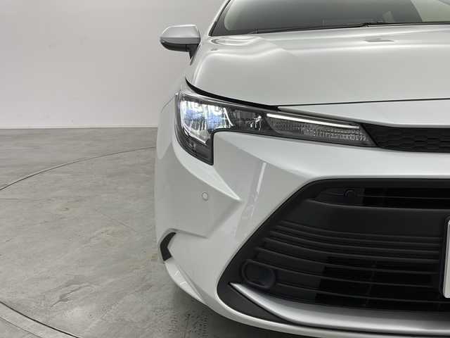 トヨタ カローラツーリング ハイブリッド G 群馬県 2024(令6)年 1.2万km プラチナホワイトパールマイカ 純正10.5型ナビ　バックカメラ　スペアタイヤ　アダプティブクルーズコントロール　衝突被害軽減ブレーキ　電動サイドブレーキ　レザーステアリング　オートハイビーム　BSM クリアランスソナー　禁煙車