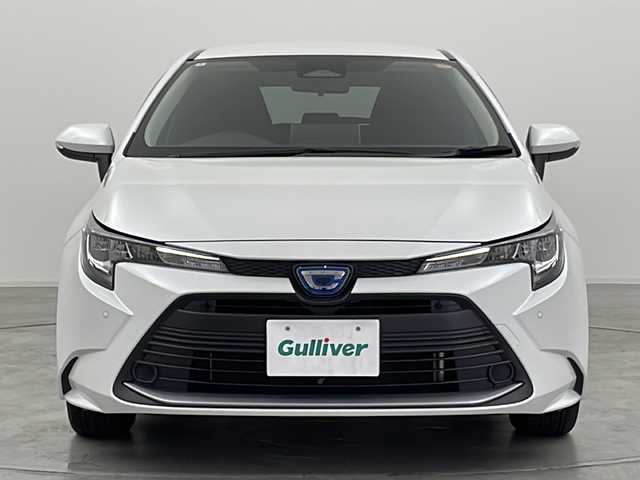 トヨタ カローラツーリング ハイブリッド G 群馬県 2024(令6)年 1.2万km プラチナホワイトパールマイカ 純正10.5型ナビ　バックカメラ　スペアタイヤ　アダプティブクルーズコントロール　衝突被害軽減ブレーキ　電動サイドブレーキ　レザーステアリング　オートハイビーム　BSM クリアランスソナー　禁煙車