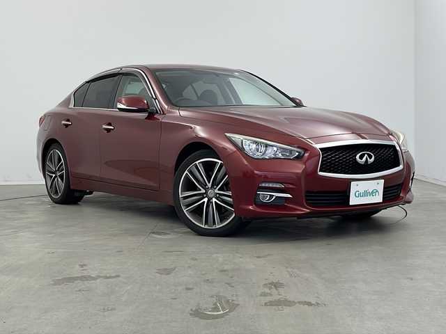 日産 スカイライン 200GT－t 新潟県 2014(平26)年 5.6万km ラディアントレッド メーカーOP/メモリナビ/CD DVD BT フルセグTV/前席パワーシート/LEDヘッドライト/バックカメラ/前後ドライブレコーダー/アイドリングストップ/OP19インチアルミホイール/ETC/ハーフレザーシート