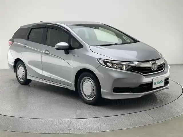 ホンダ シャトル ハイブリッド ホンダセンシング 兵庫県 2022(令4)年 5.8万km ルナシルバーM ホンダセンシング/社外メモリーナビ/（AM＆FM＆BT）/バックカメラ/ビルトインETC/レーダークルーズコントロール/オートライト/LEDライト/社外フロアマット/スマートキー/プッシュスタート/Wエアバッグ/スペアキー有り