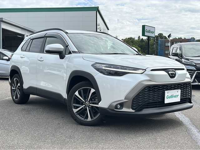 トヨタ カローラ クロス Z 石川県 2023(令5)年 4.4万km プラチナホワイトパールマイカ セーフティセンス/・プリクラッシュセーフティ/・レーダークルーズコントロール/・レーントレーシングアシスト/・オートマチックハイビーム/・ロードサインアシスト/パーキングサポートブレーキ/純正ディスプレイオーディオ/【Bluetooth・HDMI・DVD・FM/AM】/パノラミックビューモニター/パワーバックドア/運転席シートヒーター/LEDヘッドライト/・シーケンシャルターンランプ/・フォグランプ/・オートライト/スマートキー/・プッシュスタート/・スペアキー/ビルトインETC/前後ドライブレコーダー/ハーフレザーシート/純正ドアバイザー/純正フロアマット/新車時保証書/取扱説明書