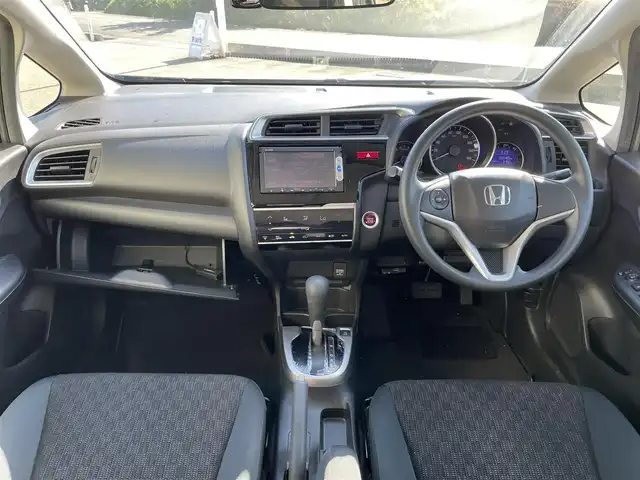 ホンダ フィット 13G Lパッケージ 富山県 2014(平26)年 5.6万km アラバスターシルバーメタリック ４ＷＤ／/ワンオーナー／/純正７インチナビ／/ワンセグＴＶ／/Ｂｌｕｅｔｏｏｔｈ／/ＤＶＤ再生／/バックカメラ／/ドライブレコーダー／/ＬＥＤオートライト／/ＥＴＣ／/ステアリングスイッチ/純正ホイールキャップ付スタッドレスタイヤ4本有