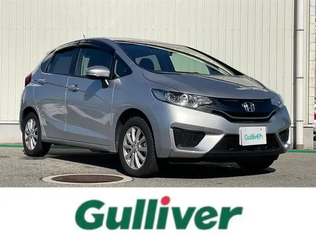 ホンダ フィット 13G Lパッケージ 富山県 2014(平26)年 5.6万km アラバスターシルバーメタリック ４ＷＤ／/ワンオーナー／/純正７インチナビ／/ワンセグＴＶ／/Ｂｌｕｅｔｏｏｔｈ／/ＤＶＤ再生／/バックカメラ／/ドライブレコーダー／/ＬＥＤオートライト／/ＥＴＣ／/ステアリングスイッチ/純正ホイールキャップ付スタッドレスタイヤ4本有