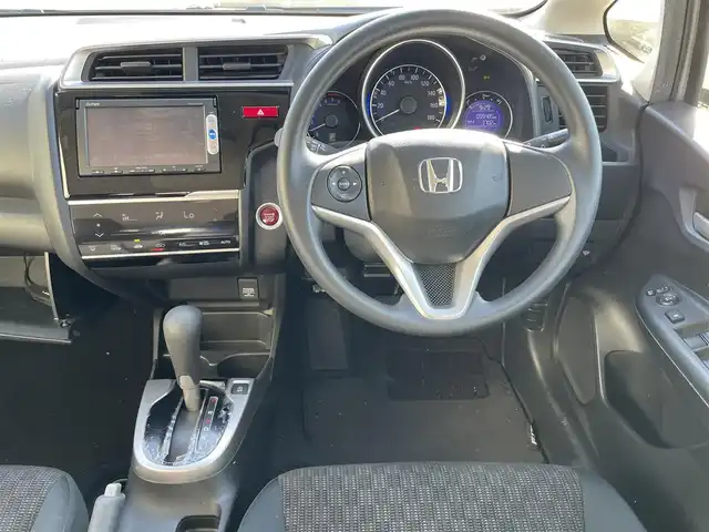 ホンダ フィット 13G Lパッケージ 富山県 2014(平26)年 5.6万km アラバスターシルバーメタリック ４ＷＤ／/ワンオーナー／/純正７インチナビ／/ワンセグＴＶ／/Ｂｌｕｅｔｏｏｔｈ／/ＤＶＤ再生／/バックカメラ／/ドライブレコーダー／/ＬＥＤオートライト／/ＥＴＣ／/ステアリングスイッチ/純正ホイールキャップ付スタッドレスタイヤ4本有