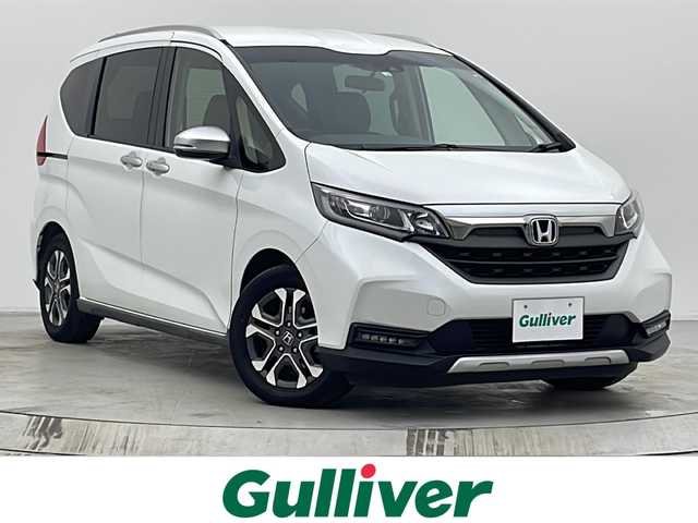 ホンダ フリード クロスター ホンダセンシング 宮城県 2020(令2)年 3.6万km プラチナホワイトパール 純正9型ナビ/・BT接続/フルセグTV/・CD/DVD/ホンダセンシング/・衝突軽減ブレーキ（CMBS）/・誤発進抑制機能/・歩行者事故低減ステアリング/・路外逸脱抑制機能/・アダプティブ・クルーズ・コントロール（ACC）/・車線維持支援システム（LKAS）/・先行車発進お知らせ機能/・標識認識機能/純正15インチAW/純正フロアマット/LEDヘッドライト/・フォグランプ