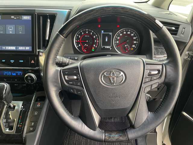 トヨタ アルファード S Cパッケージ 愛知県 2018(平30)年 5.2万km ホワイトパールクリスタルシャイン トヨタセーフティセンス/純正10型ナビ　SDカードなし/フリップダウンモニター/三眼LEDヘッドライト/両側パワースライドドア/レーダークルーズコントロール/シートヒーター/エアシート/パワーシート/コーナーセンサー/純正アルミホイール/ETC2.0/ステアリングヒーター/インテリジェントミラー/リアオートエアコン/オートマチックハイビーム/衝突軽減システム/フルセグ/CD DVD/Bluetooth/ステアリングスイッチ/スマートキー/プッシュスタート