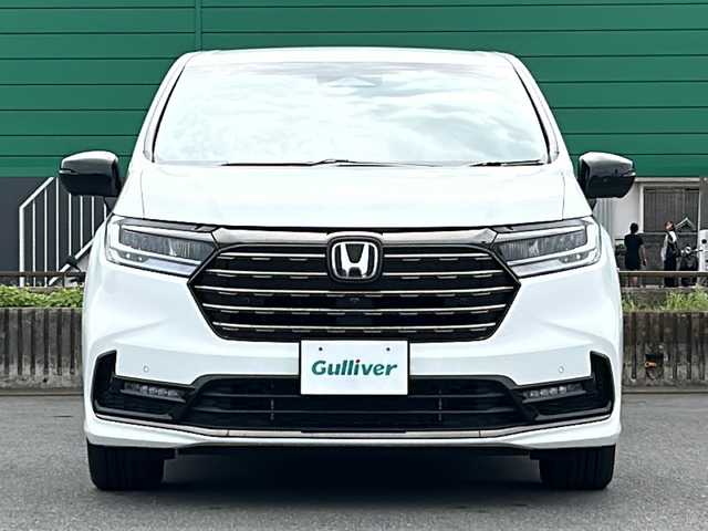 ホンダ オデッセイ ハイブリッド e:HEVアブソルート EXブラックED 茨城県 2023(令5)年 0.4万km プラチナホワイトパール ホンダセンシング/純正11.4インチナビ/ブラインドスポットモニター/衝突軽減システム/レーンキープアシスト/横滑り防止装置/バックカメラ/全周囲カメラ/マルチビューカメラ/両側パワースライドドア/パワーバックドア/レーダークルーズコントロール/LEDオートライト/オートマチックハイビーム/レザーシート/シートヒーター/パワーシート/純正18アルミホイール/SOSボタン/パドルシフト/ワイアレス充電/HDMI/USB入力端子/ETC