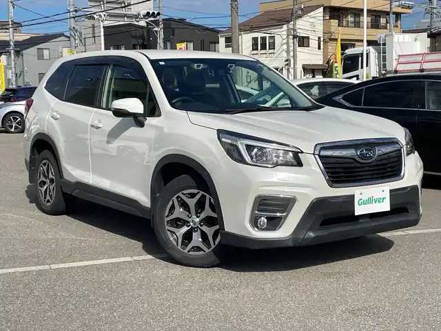 スバル フォレスター ツーリング 石川県 2018(平30)年 4.1万km パール 純正メモリーナビ/フルセグTV/バック＆サイドカメラ/LEDヘッドライト/ETC/ハーフレザーシート/シートヒーター/純正アルミホイール/デジタルミラー/ブラインドスポットモニター/レーダークルーズ/アイサイト/ドラレコ/オートライト