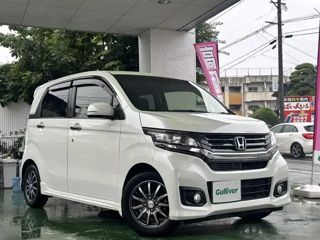 ホンダ Ｎ ＷＧＮ カスタム G ターボパッケージ 熊本県 2015(平27)年 8.2万km プレミアムホワイトパール 純正ナビ（VXM-152VFi）/【フルセグTV/CD/DVD/Bluetooth/MusicRack】/バックカメラ/シティブレーキアクティブシステム（CTBA）/クルーズコントロール/パドルシフト/黒ハーフレザーシート/ドライブレコーダー（DRV-220D）/純正14インチAW/ECON/横滑り防止機能/オートライト/LEDヘッドライト/フォグランプ/純正フロアマット/純正ドアバイザー/革巻きステアリング/ステアリングスイッチ/保証書/取扱説明書