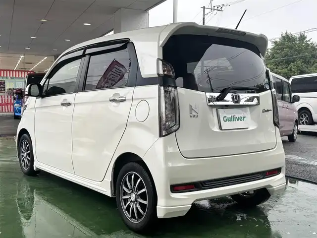 ホンダ Ｎ ＷＧＮ カスタム G ターボパッケージ 熊本県 2015(平27)年 8.2万km プレミアムホワイトパール 純正ナビ（VXM-152VFi）/【フルセグTV/CD/DVD/Bluetooth/MusicRack】/バックカメラ/シティブレーキアクティブシステム（CTBA）/クルーズコントロール/パドルシフト/黒ハーフレザーシート/ドライブレコーダー（DRV-220D）/純正14インチAW/ECON/横滑り防止機能/オートライト/LEDヘッドライト/フォグランプ/純正フロアマット/純正ドアバイザー/革巻きステアリング/ステアリングスイッチ/保証書/取扱説明書