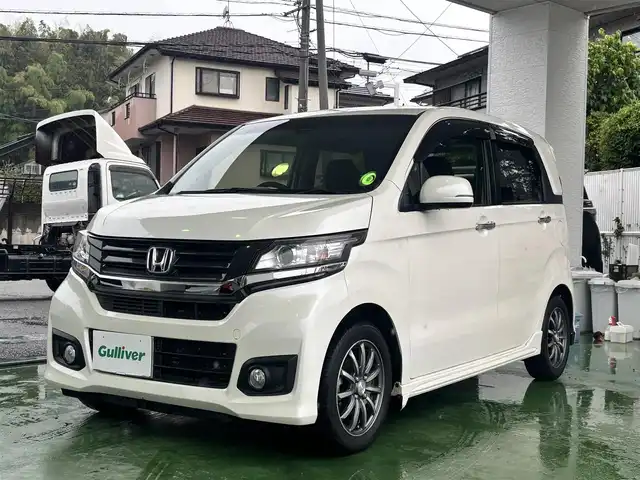 ホンダ Ｎ ＷＧＮ カスタム G ターボパッケージ 熊本県 2015(平27)年 8.2万km プレミアムホワイトパール 純正ナビ（VXM-152VFi）/【フルセグTV/CD/DVD/Bluetooth/MusicRack】/バックカメラ/シティブレーキアクティブシステム（CTBA）/クルーズコントロール/パドルシフト/黒ハーフレザーシート/ドライブレコーダー（DRV-220D）/純正14インチAW/ECON/横滑り防止機能/オートライト/LEDヘッドライト/フォグランプ/純正フロアマット/純正ドアバイザー/革巻きステアリング/ステアリングスイッチ/保証書/取扱説明書