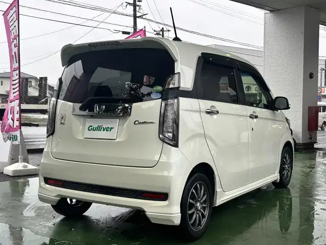 ホンダ Ｎ ＷＧＮ カスタム G ターボパッケージ 熊本県 2015(平27)年 8.2万km プレミアムホワイトパール 純正ナビ（VXM-152VFi）/【フルセグTV/CD/DVD/Bluetooth/MusicRack】/バックカメラ/シティブレーキアクティブシステム（CTBA）/クルーズコントロール/パドルシフト/黒ハーフレザーシート/ドライブレコーダー（DRV-220D）/純正14インチAW/ECON/横滑り防止機能/オートライト/LEDヘッドライト/フォグランプ/純正フロアマット/純正ドアバイザー/革巻きステアリング/ステアリングスイッチ/保証書/取扱説明書