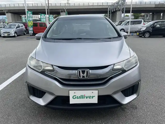 ホンダ フィット ハイブリット Fパッケージ 石川県 2014(平26)年 8.6万km ティンテッドシルバーM 社外メモリーナビ/CD/フルセグTV/スマートキー/プッシュスタート/電動ミラー/ABS/オートエアコン