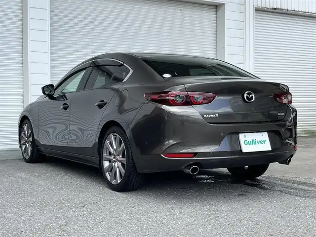 マツダ マツダ３セダン 高知県 2019(令1)年 5.3万km チタニウムフラッシュマイカ 純正ナビ/全方位カメラ/アイドリングストップ/クルーズコントロール/ETC/ドライブレコーダー/ターボ/オートエアコン/Bluetooth接続/運転席パワーシート/純正18インチアルミホイール/横滑り防止装置/コーナーセンサー/盗難防止装置/LEDオートライト/オートマチックハイビーム/運転席＋助手席＋サイドエアバッグ/パーキングセンサー