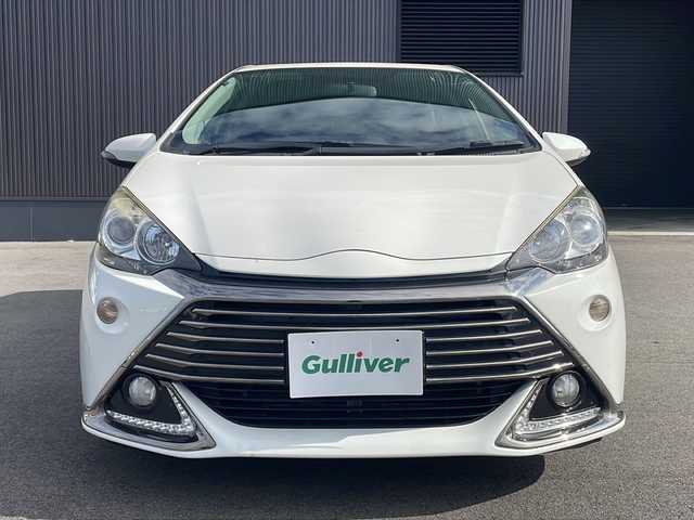 トヨタ アクア G G’s 新潟県 2014(平26)年 9.8万km ライムホワイトパールクリスタルシャイン ＊SDナビ/＊シートヒーター/＊Gs17インチホイール/＊横滑り防止装置/＊盗難防止装置/＊Autoライト/＊社外LEDライト/＊電動格納ミラー/＊光軸レベライザー/＊パワーステアリング/＊パワーウインドウ/＊純正フロアマット/＊純正ドアバイザー