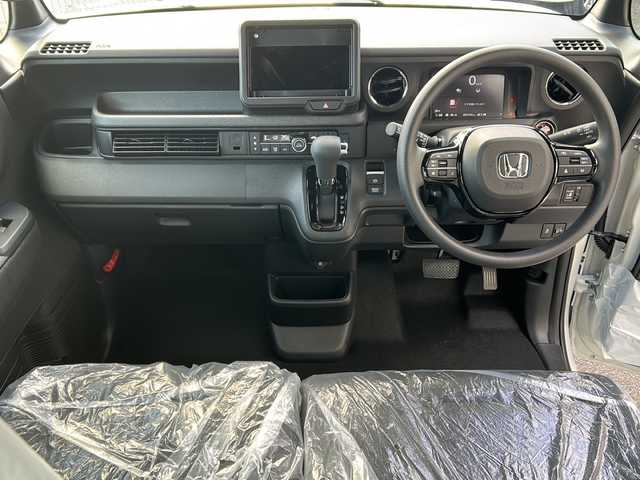 ホンダ Ｎ ＢＯＸ カスタム 広島県 2025(令7)年 0.1万km プラチナホワイトパール Honda SENSING/●衝突軽減ブレーキ（CMBS）/●先行車発進お知らせ機能/●歩行者事故低減ステアリング/●路外逸脱抑制機能/●標識認識機能/●渋滞追従機能付アダプティブクルーズコントロール（ACC）/●車線維持支援システム（LKAS）/●誤発進抑制機能/●後方誤発進抑制機能/●近距離衝突軽減ブレーキ/●急アクセル抑制機能/●パーキングセンサーシステム/●オートハイビーム/ダイレクトプロジェクション式フルLEDヘッドライト/シーケンシャルターンランプ/片側パワースライドドア/ナビ装着用スペシャルパッケージ/シートヒーター（D/N）/フロントシートアームレスト（運転席）/オートリトラミラー/スマートキー/プッシュスタート/ロールサンシェード/フルエアコン/W+サイド+カーテンエアバッグ/電子制御パーキングブレーキ/オートブレーキホールド機能/360°スーパーUV・IRカット パッケージ/エマージェンシーストップシグナル/トリコットシート（ブラック）/14インチアルミホイール（シャークグレー塗装＋切削）
