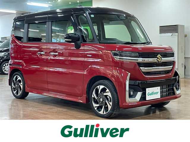 スズキ スペーシア カスタム HYBRID XS ターボ 道央・札幌 2024(令6)年 0.7万km フェニックスレッドパール/ブルーイッシュブラックパール ワンオーナー/ターボ車/社外SDナビ（8インチ）/フルセグ/CD/ DVD/BT/MS/バックカメラ/衝突軽減ブレーキ/レーンキープアシスト/横滑り防止/アイドリングストップ/両側パワースライドドア/レーダークルーズコントロール/パドルシフト/ハーフレザーシート/ステアリングヒーター/シートヒーター（D/N）/ミラーヒーター/ヘッドアップディスプレイ/プッシュスタート/スマートキー×2/純正エンジンスターター/革巻きステアリング/電動パーキングブレーキ/ドライブレコーダー（前後タイプ）/オートライト/LEDヘッドライト/フォグランプ/クリアランスソナー/社外AW付スタッドレスセット積込み/　165/55/15 2023年製8mm/保証書/取扱説明書/ナビ取扱説明書