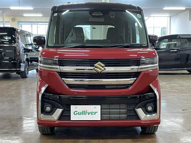 スズキ スペーシア カスタム HYBRID XS ターボ 道央・札幌 2024(令6)年 0.7万km フェニックスレッドパール/ブルーイッシュブラックパール ワンオーナー/ターボ車/社外SDナビ（8インチ）/フルセグ/CD/ DVD/BT/MS/バックカメラ/衝突軽減ブレーキ/レーンキープアシスト/横滑り防止/アイドリングストップ/両側パワースライドドア/レーダークルーズコントロール/パドルシフト/ハーフレザーシート/ステアリングヒーター/シートヒーター（D/N）/ミラーヒーター/ヘッドアップディスプレイ/プッシュスタート/スマートキー×2/純正エンジンスターター/革巻きステアリング/電動パーキングブレーキ/ドライブレコーダー（前後タイプ）/オートライト/LEDヘッドライト/フォグランプ/クリアランスソナー/社外AW付スタッドレスセット積込み/　165/55/15 2023年製8mm/保証書/取扱説明書/ナビ取扱説明書